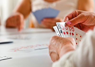 Residents playing Gin Rummy at Park Place of Elmhurst